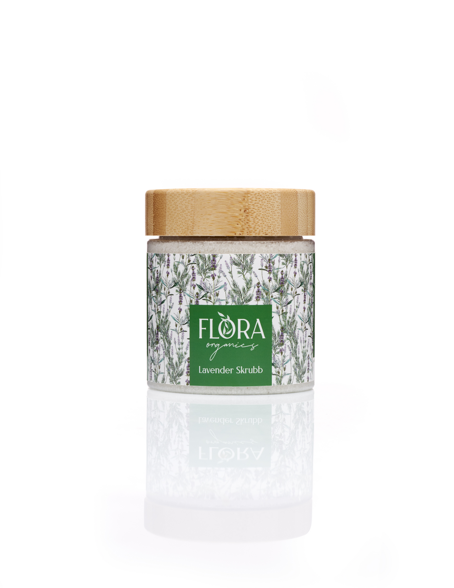 Flora Organics Lavender Scrub in glass jar with bamboo lid, reflected on white background