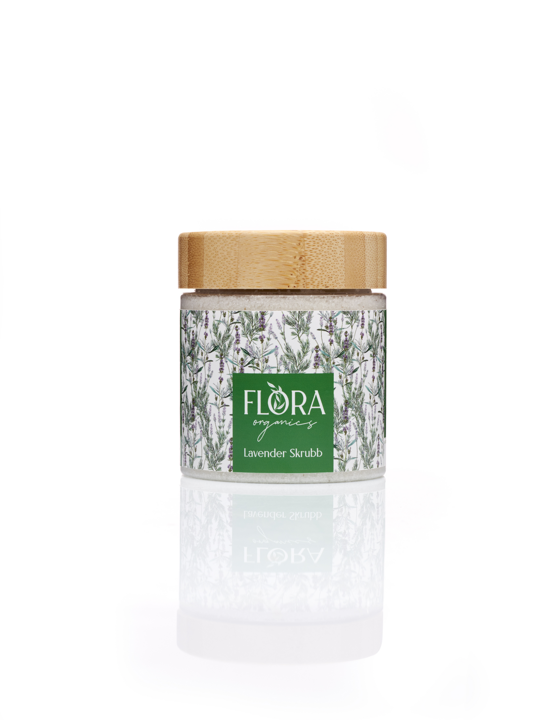 Flora Organics Lavender Scrub in glass jar with bamboo lid, reflected on white background